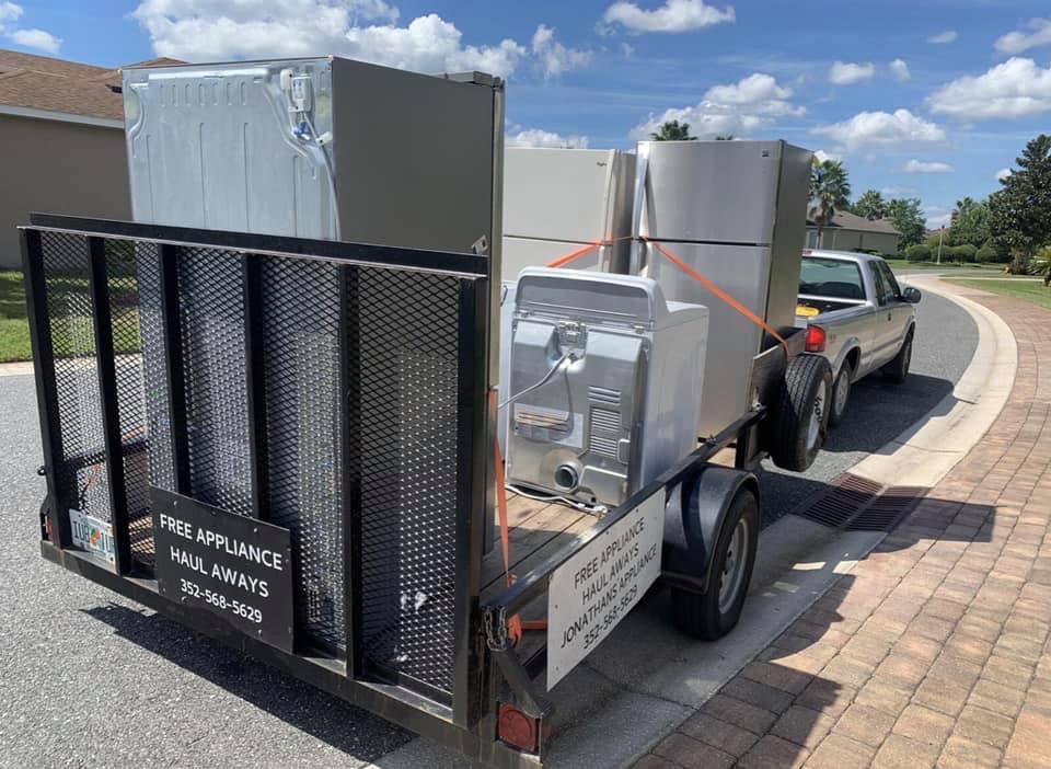 appliances for disposal on trailer